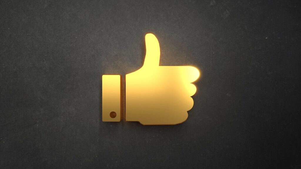 金色の手のロゴ